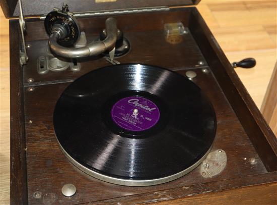 An HMV oak tabletop wind-up gramophone